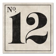 a black and white sign with the number twelve in it's center, which reads no