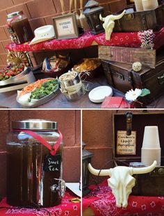 the table is set up with food and drinks for an outdoor party or gathering, including a cow skull head