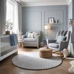 a baby's room with grey walls and white furniture, including a rocking chair