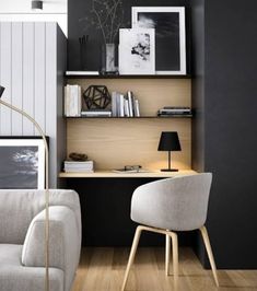 a living room filled with furniture and a book shelf on top of a hard wood floor