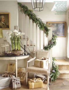 an open magazine with presents on the stairs