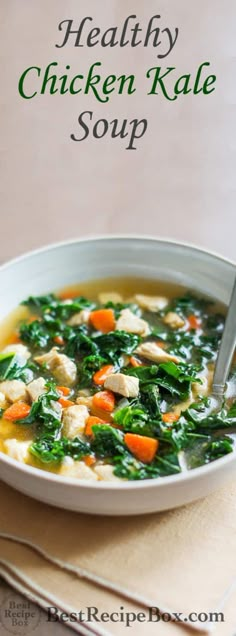 healthy chicken kale soup in a white bowl