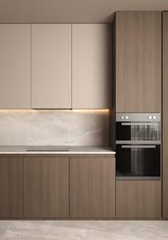 a modern kitchen with an oven, sink and countertop area in light wood tones