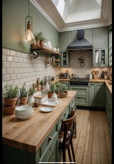 a kitchen filled with lots of green cabinets and wooden counter top next to a stove top oven