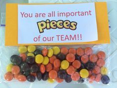 there is a bag with candy in it that says you are all important pieces of our team