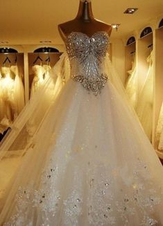 a wedding dress on display in a store