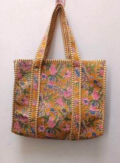 Women Tote Bag Handmade Block Printed Quilted Shoulder Bag's Indian Shopping Handbag Throw Cotton Quilted block print weekend bags 100% cotton fabric SIZE:- 18 inch X 18 Inch X 7 Inch Usage : Cosmetic, Make-up, Travel, Toiletries, Tote Bag, Medicine, Accessories, Shoulder Bags, Handle Bag, Women Bags, Cosmetic Bag, Gift For Her, Bridesmaid Bag, Storage Bag, Grocery Bag, Shopping Bag, Carry Bags, Jhola Bag, Market Bag, Vintage Bags, Picnic Bags, Etc Shopping and much more. Perfect for Beach Visits/ Quick Grocery runs/ Carrying Kids items/ Artist Paint book and Paints /Extra Bag Washable on Cold / Delicate wash Gorgeous Prints of Hand printed cotton are brought together to give an alternate to plastic bags usage . Posted in a flat pack folded. NOTE: ✔ Disclaimer: Natural-dyed colors might bl Bridesmaid Bags, Picnic Bag, Tote Bags Handmade, Jungle Print, Kids Items, Sustainable Gifts, Rajasthan India, Print Style, Boho Bag