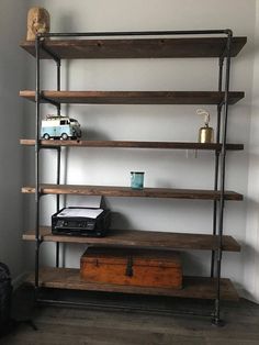 an old suitcase is sitting on a shelf