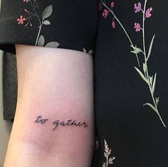 a woman's arm with a tattoo that says to gather on the side of her arm