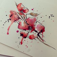 watercolor painting of pink flowers on white paper with black dots around the edges and bottom