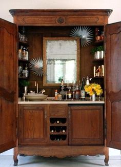 a bathroom with wooden cabinets and white tile flooring