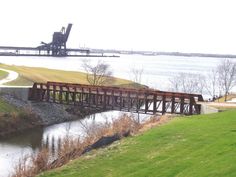 an old train bridge over a body of water