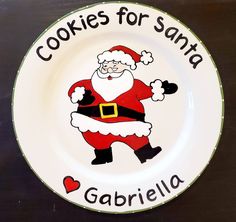 a plate with a santa clause on it and cookies for santa written on the front