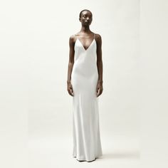 Silk Slip Dress Elegant Long Slip Dress For Cocktail, Chic White Slip Dress For Dinner, White Silk Slip Dress For Cocktail, Elegant Spring Evening Slip Dress, Sleek Summer Maxi Dress For Dinner, Classic Summer Evening Maxi Dress, Sleek Slip Dress For Dinner In Spring, Sleek Slip Dress For Dinner And Spring, Sleek Summer Wedding Maxi Dress