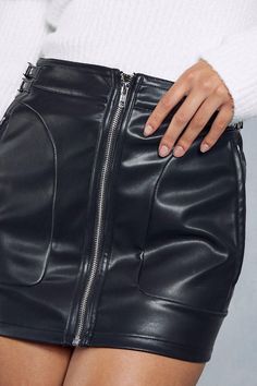 Sleek faux leather finish with high-waisted fit 
 Flattering panelled construction shapes the figure 
 Versatile micro length transitions from day to night 
This faux leather mini skirt from Misspap is an edgy wardrobe essential. With its body-hugging fit, it flatters your silhouette, while the high waist cinches you in. The smooth leather-look texture and asymmetric zip detailing add interest. Pair this skirt with a jumper and boots for a casual daytime look. For nighttime, match it with heels and a cami top to show off its versatile styling. With its straight hem and panelled construction that skims in all the right places, this micro mini transitions effortlessly from day to casual nighttime events. Mini Skirt Black, Faux Leather Mini Skirt, Micro Mini Skirt, Leather Mini Skirt, Tall Clothing, Faux Leather Skirt, Body Con Skirt, Leather Mini Skirts, Skirt Black