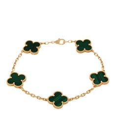 This is an authentic VAN CLEEF & ARPELS 18K Yellow Gold Malachite 5 Motifs Vintage Alhambra Bracelet. The bracelet is crafted of 18 karat yellow gold and features five clover motif stations set with malachites. Jewelry Van Cleef, Van Cleef Alhambra, Vintage Alhambra Bracelet, Alhambra Bracelet, Gold Vans, Van Cleef And Arpels Jewelry, Van Cleef & Arpels, Authentic Vans, Van Cleef And Arpels