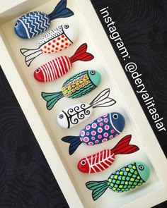 five colorful fish in a white box on a black background with the words, this is an easy way to decorate your home