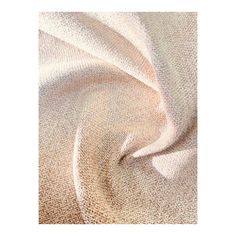 an image of a white fabric textured with light brown and cream colors, as seen from above