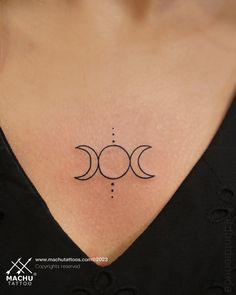 a woman's chest with three phases on it