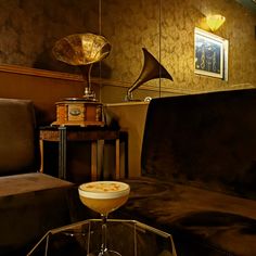 a living room filled with furniture and an old record player