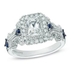 a diamond and blue sapphire engagement ring on a white background with the words loving love written in