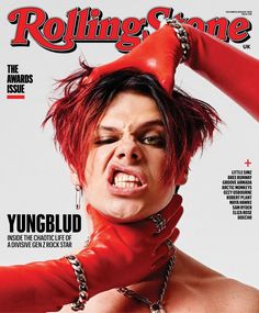 the cover of rolling stone magazine with a woman wearing red gloves and chains on her head