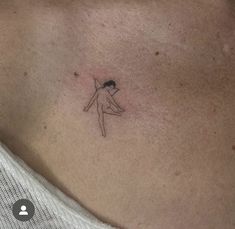 a person with a tattoo on their chest