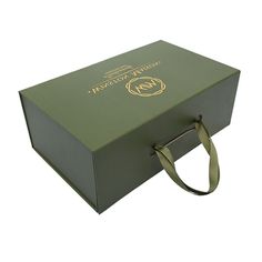 an open green box with a ribbon on the side and a logo on the inside