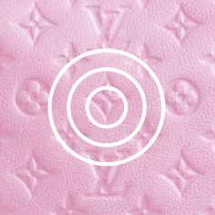 the louis vuitton logo is shown in white on a pink wallpaper background