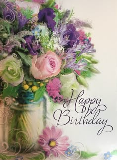 a happy birthday card with flowers in a vase