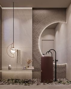 the bathroom is decorated in neutral tones and features a circular light fixture that hangs from the ceiling