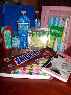 the contents of a diaper bag are displayed on a table