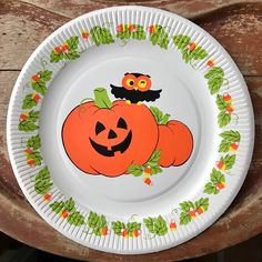 a paper plate with an image of two pumpkins on it