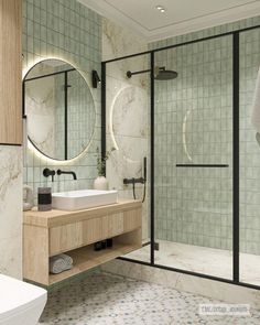 a bathroom with a sink, mirror and shower stall