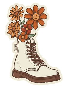 a pair of white boots with flowers in them