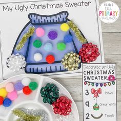 a christmas sweater craft is shown next to a plate with candy and decorations on it