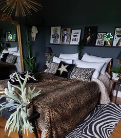 a leopard print bed spread in a bedroom