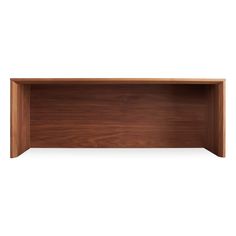 an empty wooden shelf against a white background