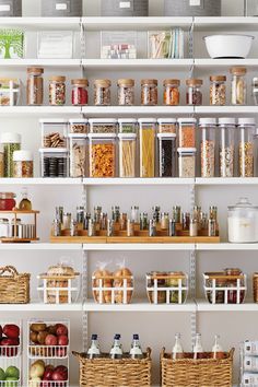 shelves filled with lots of different types of food in baskets and containers next to each other