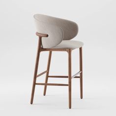 an upholstered bar stool with arms and backrests in light grey fabric