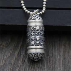 This Pure Silver 999 Pendant Tibetan Good Fortune will bring luck and peaceful in your life once you put it around your neck. Silver Ingot, Heart Sutra, Luck Charm, Luck Charms, Silver Pendants, Good Fortune, Metal Pendant, Silver Coins, Pure Silver