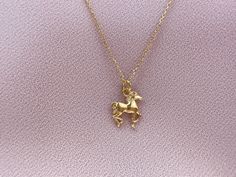 Horse lover pendant on Anchor Chain made of 24k gold plated sterling silver. You can add a message card to your order at the checkout. Each item is beautifully packaged in a branded box, ready for gift giving. Our jewellery is designed to make You feel unique. Create Your style with pieces from our collection. Chain length 40 cm Pendant size 12x14,5 mam Items are handmade and may have slight variations between the same items. Caring tips: * Remove your jewellery before bathing, swimming or exerc Dainty Pendant Charm Necklace, Mother's Day Gold Necklace With Gift Box, Yellow Gold Charm Necklace With Adjustable Chain As Gift, Gold Jewelry For Birthday Gift With Gift Box, Gold Jewelry Birthday Gift With Gift Box, Gold Jewelry With Gift Box For Mother's Day, Yellow Gold Necklaces With Charms For Birthday Gift, Yellow Gold Pendant Charm Necklace For Her, Gold Necklaces For Best Friend Gift On Mother's Day