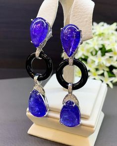 ONE OF A KIND HANDCRAFTED EARRINGS. IN STOCK! READY FOR SHIPPING! GIFT WRAP AVAILABLE! FREE UPS EXPRESS! MAJESTIC! Enormous Tanzanites in pairs! Extremely rare! Wear these earrings to a party and everyone will not be able to take their eyes off! So huge and so vivid blue. STUNNING 59.34TCW, Certified TANZANITE and diamond chandelier earrings. UNIQUE DESIGN! ONE OF A KIND! TRANSPARENT, LARGE, SPARKLING GEMSTONES IN PAIRS! Extremely rare! Surrounded by TOP GRADE, F/VS DIAMONDS! Set in 18K solid wh Luxury Tanzanite Earrings, Luxury Round Tanzanite Earrings, Luxury Tanzanite Drop Earrings, Luxury Tanzanite Pear-shaped Jewelry, Luxury Pear-shaped Tanzanite Jewelry, Formal Drop Cabochon Earrings, Luxury Tanzanite Gemstone Earrings, Luxury Tanzanite Earrings With Gemstone, Luxury Sapphire Drop Jewelry