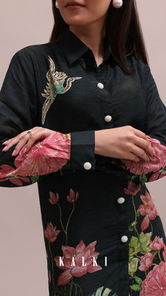 Enhance the summer elegance in our Black Floral Printed Linen Co-ord Set.
Crafted from cotton fabric, the set is adorned with intricate floral prints and shimmering sequins and mirrors.
Complete with a shirt collar neckline and full sleeves, it's a versatile choice for casual outings.
Pack includes one kurta, pants, and an inner. Floral Print Coord Set, Semi-stitched Floral Print Sets For Designer Wear, Co Ord Sets Two Pieces Floral Prints, Floral Co Ord Set, Floral Print Co Ord Set, Summer Co Ords, Summer Elegance, Linen Summer