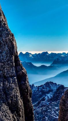 a person standing on top of a mountain