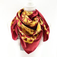 This beautiful burgundy red polyester scarf is decorated with delicate patterns, bringing a touch of femininity and elegance to any outfit. Lightweight and soft to the touch, it is perfect for adding a touch of color and style to your wardrobe. This versatile scarf is a must-have accessory for all women looking for a trendy and sophisticated look. It is in very good condition for its age (see photos). The label is still present with the letters L.A. Dimensions: 33.46x33.46 in / 85x85cm My items Elegant Red Silk Shawl, Formal Red Shawl Scarf, Elegant Red Silk Scarf As A Gift, Elegant Red Silk Scarf As Gift, Elegant Red Silk Scarf For Gift, Elegant Gold Shawl For Gift, Red Vintage Shawl As Gift, Elegant Gold Shawl Gift, Vintage Red Shawl As Gift