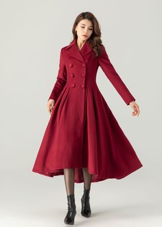 "FEATURES 50% wool, 50% wool blend Fully liner with polyester Two side pockets Lapel collar Long sleeve Button closure in front Double breasted coat Irregular hemline For Winter, Autumn dry clean ★★Mode size Height 170cm (5′ 7″)  Bust 84 cm (33\")  Waist 66 cm (26\")  She wears size XS. ★★Bespoke Order Service If you Request other color Request the length Your height is not between 155 cm- 175 cm Your weight is not between 47 kg -77 kg I can do it for you, It will need some extra fee depending o Formal Fitted A-line Wool Coat, Elegant Fitted A-line Wool Coat, Fitted A-line Wool Coat For Spring, Fitted A-line Spring Wool Coat, Spring A-line Fitted Wool Coat, Fitted Double-breasted Winter Dress, Fitted Red Wool Long Coat, Winter Double-breasted Dress With Button Fastening, Fitted Solid Color Double-breasted Wool Coat