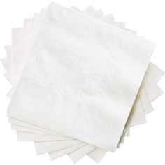 six white napkins stacked on top of each other