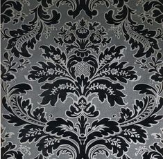 black and white wallpaper with an ornate design