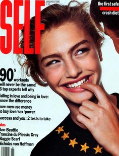 a woman is smiling on the cover of self magazine with her hand under her chin